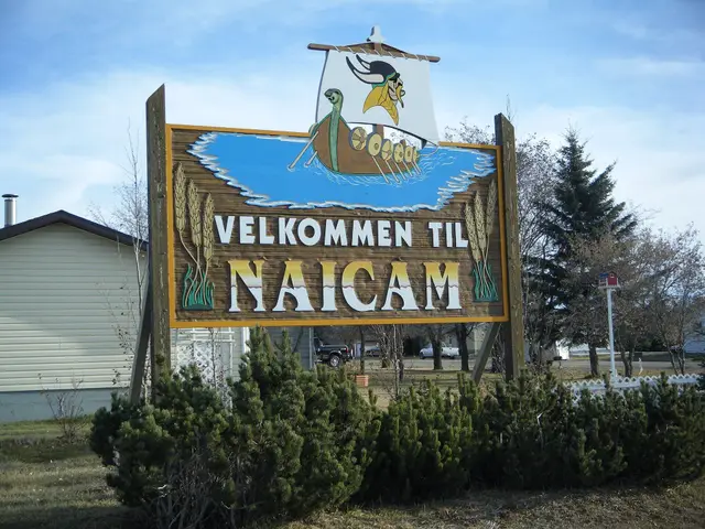 Velkommen til Naicam welcome sign with Viking ship